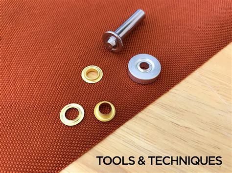 putting metal holes in fabric|how to install metal grommets.